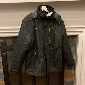 Waterproof and Windproof Winter/SKI JACKET w/ hood in black by Gemyse. Size L.